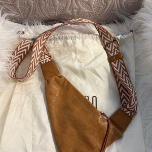 NWOT HOBO Bodhi sling Bag with Chevron Strap in the color Whiskey.